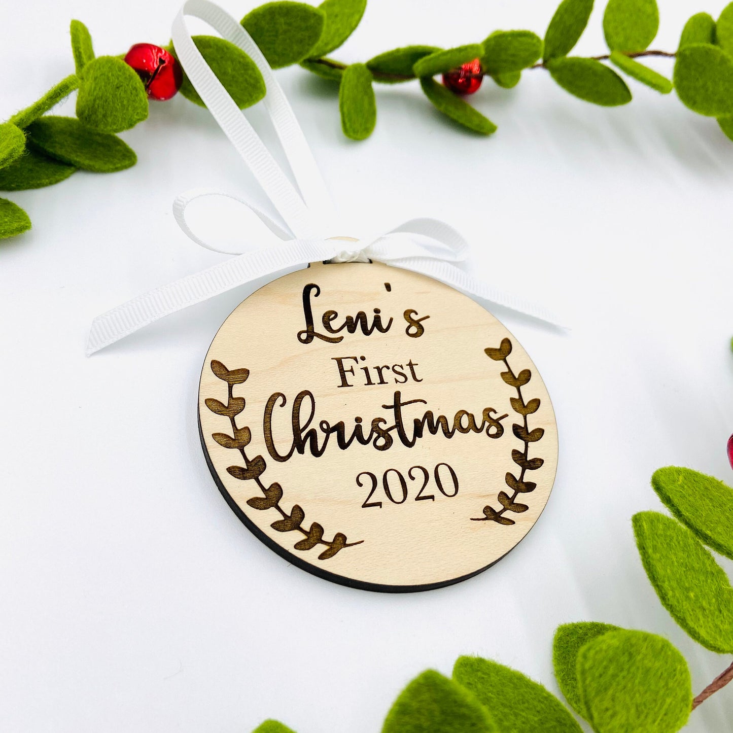 Custom laser engraved baby's first Christmas ornament