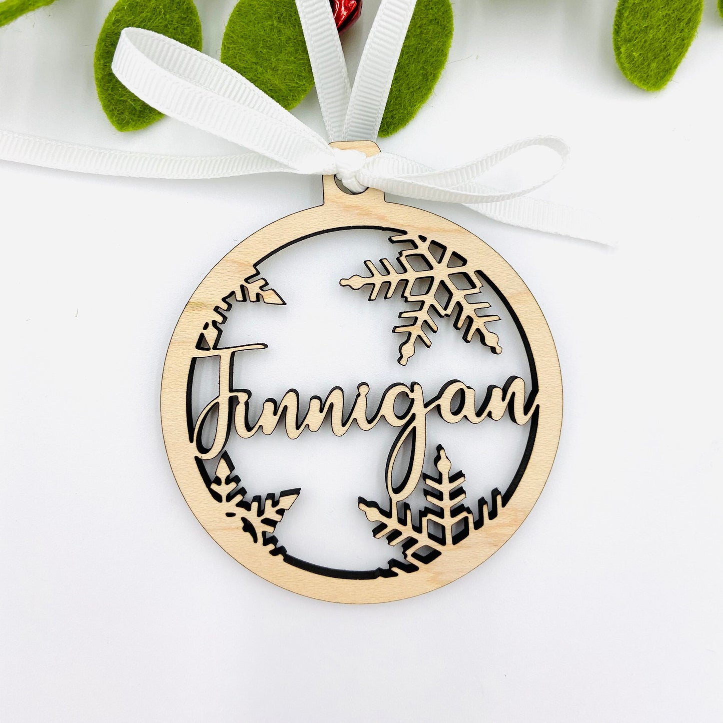 Custom laser cut name and snowflake Christmas ornament