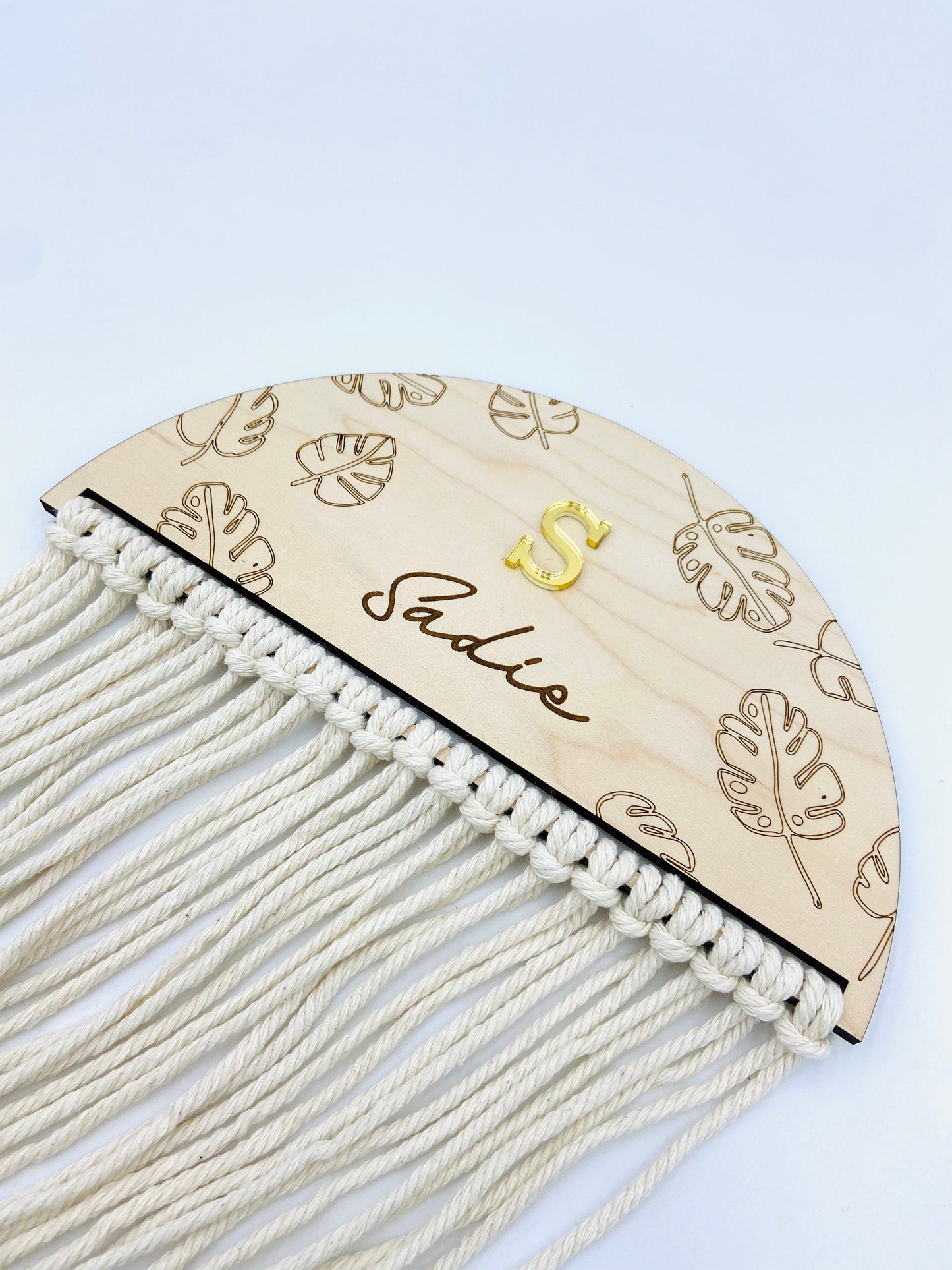 Wood engraved macrame bow holder