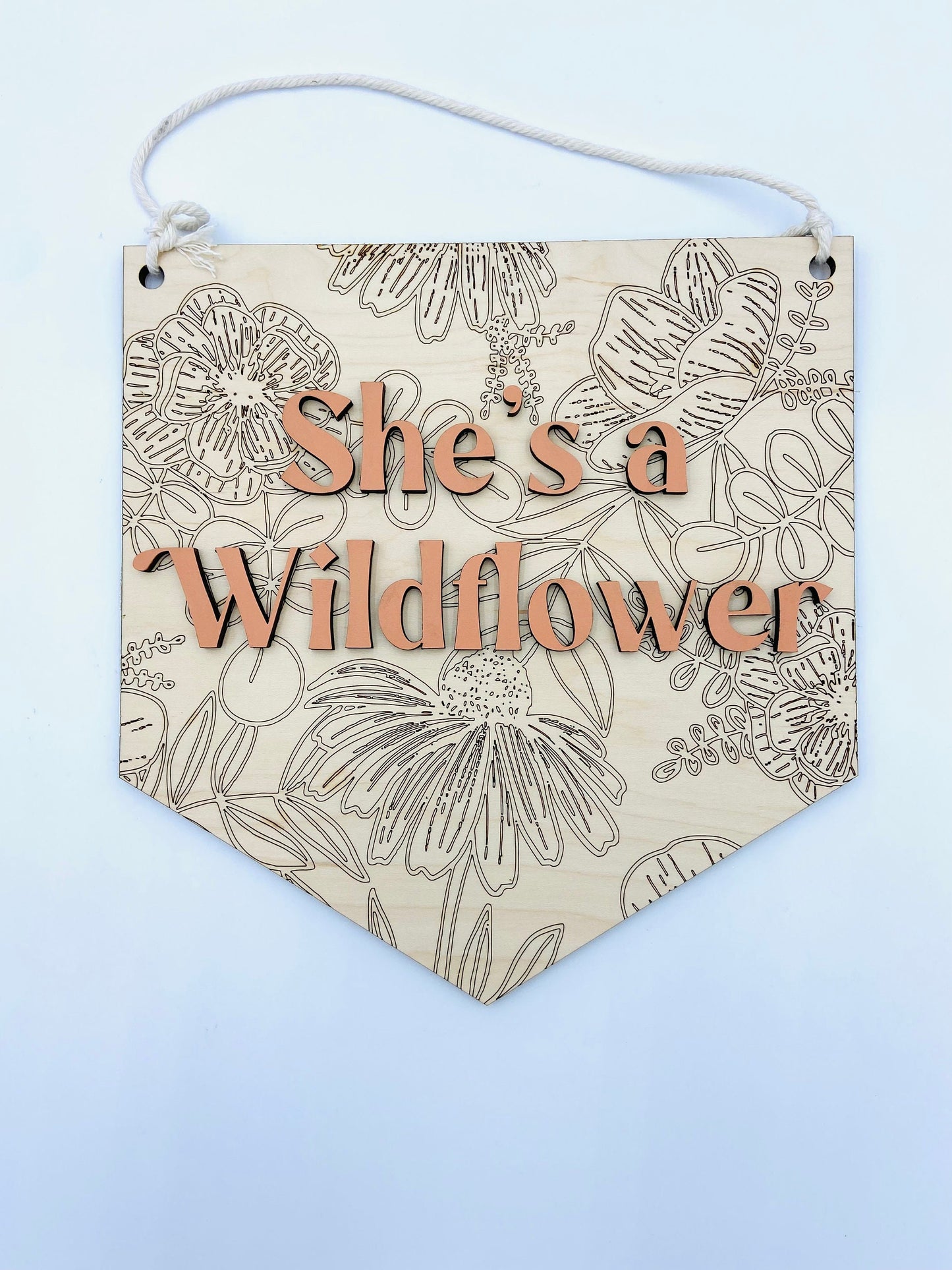 She's a wildflower wooden wall hanging